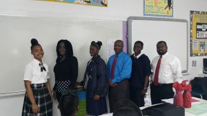 BISX Executives pictured with C. V. Bethel Grade 11 Students